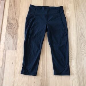 Lululemon. Black Cropped Sides And Waist Pockets Size 10
